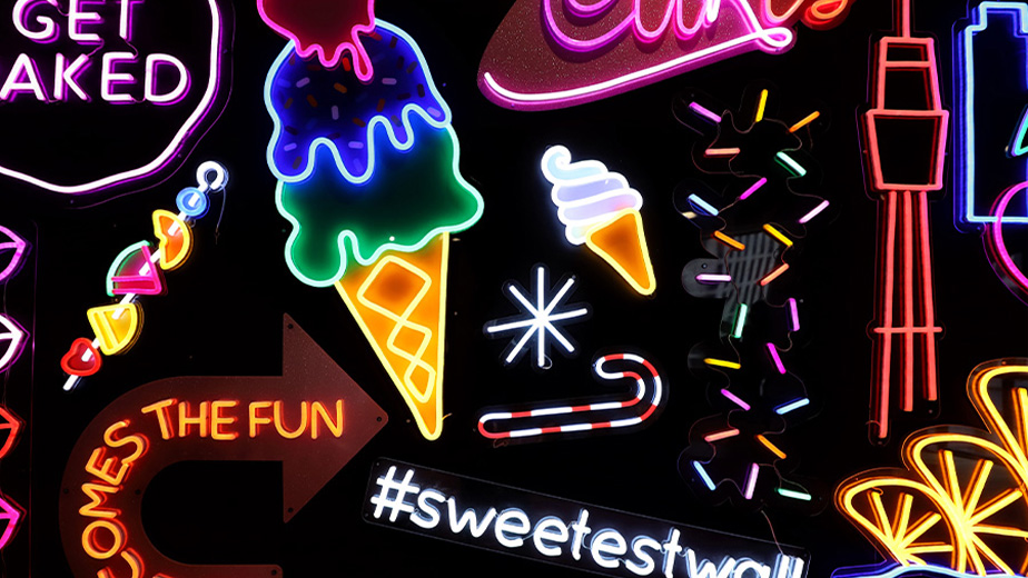 a collage of neon signs related to sweet treats